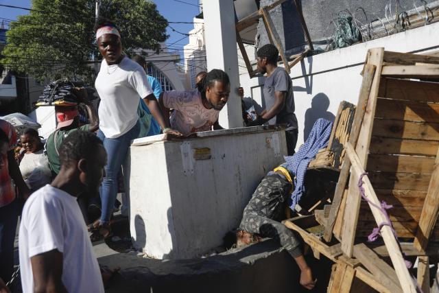 Gangs Unleash Terror on Haiti's Affluent Neighborhoods, Leaving Over a Dozen Dead

