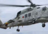 Japan helicopter crash: One dead and seven missing after two military aircraft collide