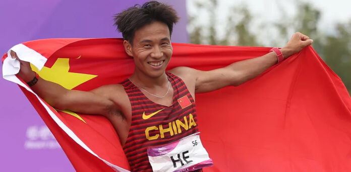 Chinese runner stripped of Beijing marathon win after video shows rivals let him take first place