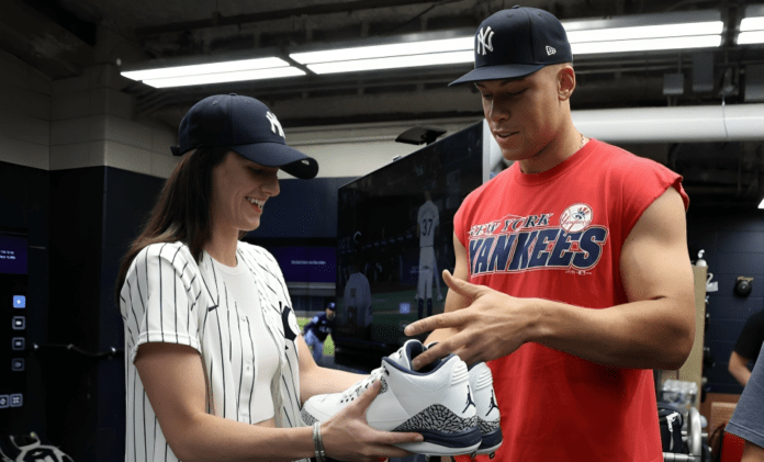 Caitlin Clark Gets a ‘Big Foot’ Moment: Aaron Judge’s Giant Signed Cleats Leave WNBA Rookie Speechless, Yankees Captain in Hysterics